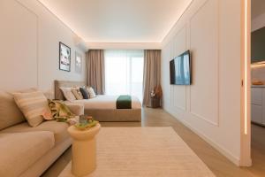 TV a/nebo společenská místnost v ubytování Cortina North - Skyline Studio with City Views