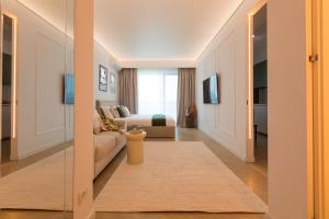 Postel nebo postele na pokoji v ubytování Cortina North - Skyline Studio with City Views