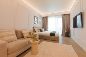 TV a/nebo společenská místnost v ubytování Cortina North - Skyline Studio with City Views + 32 fotografií