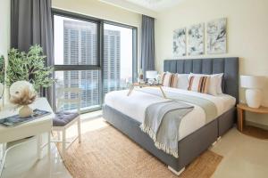 Кровать или кровати в номере Frank Porter - Harbour Views T1