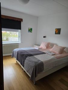 Postel nebo postele na pokoji v ubytování Spói Guesthouse