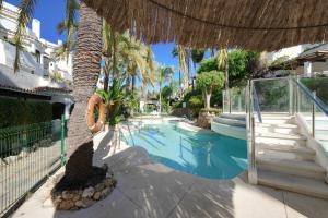 Bazén v ubytování 1081 beachfront penthouse jacuzzi roofterace lounge wifi nebo v jeho okolí