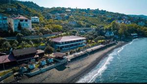 an aerial view of a resort on the beach at Pasa Tatil Koyu in Akcaabat