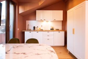 Kuchyň nebo kuchyňský kout v ubytování San Giuseppe Suite Lake Como