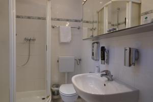 Koupelna v ubytování Hotel Xantener Eck