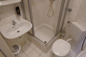 Koupelna v ubytování Hotel Xantener Eck