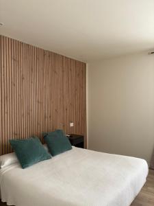 A bed or beds in a room at Hotel La Mota by Punta25 Hotels Group