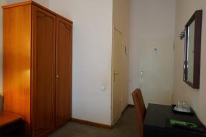 TV a/nebo společenská místnost v ubytování Hotel Xantener Eck