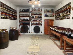 a room filled with lots of bottles of wine at Crama Diaconu in Anenii Noi