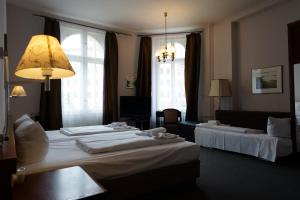 Postel nebo postele na pokoji v ubytování Hotel Xantener Eck
