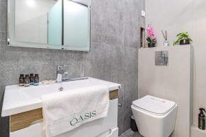 Koupelna v ubytování Oasis Халал апартаменты возле самой большой Мечети Центральной Азии + 27 fotografií