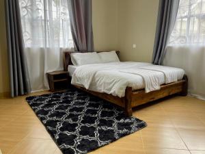 Katil atau katil-katil dalam bilik di Velam Homestay