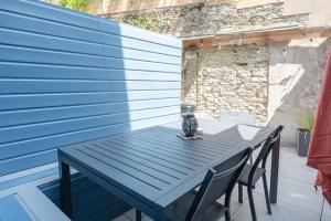 En balkon eller terrasse på Ker des Halles - 600m centre - 300m port + 9 billeder