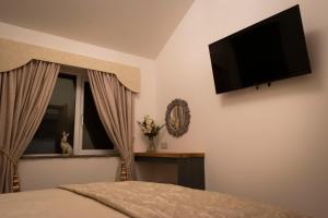 Μια τηλεόραση ή/και κέντρο ψυχαγωγίας στο Sunnie view lodge 2 bedroom