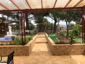 A garden outside Villa Evenik
