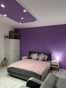 Postel nebo postele na pokoji v ubytování Apartman LILLY