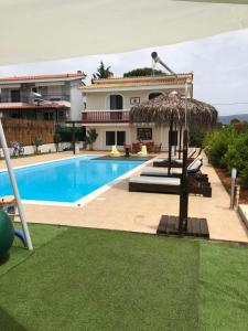 The swimming pool at or close to Villa Evenik