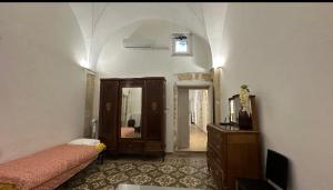 Postel nebo postele na pokoji v ubytování Casa Scarciglia