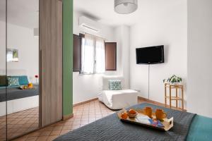 Μια τηλεόραση ή/και κέντρο ψυχαγωγίας στο Didi House Duomo