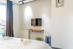 TV a/nebo společenská místnost v ubytování Apartments Joana