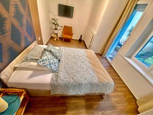 Letto o letti in una camera di Two rooms with bath