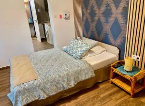 Letto o letti in una camera di Two rooms with bath
