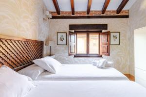 A bed or beds in a room at Casa Vallejo en Barcenaciones