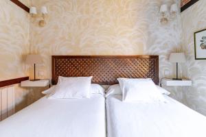 A bed or beds in a room at Casa Vallejo en Barcenaciones