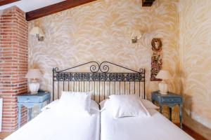 A bed or beds in a room at Casa Vallejo en Barcenaciones