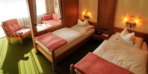 Postel nebo postele na pokoji v ubytování Steinbach-Hotel
