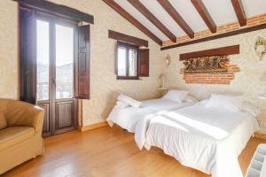 A bed or beds in a room at Casa Vallejo en Barcenaciones