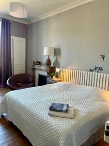 Posteľ alebo postele v izbe v ubytovaní Gîte au Balcon
