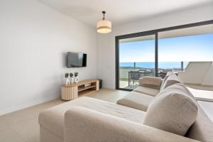 Μια τηλεόραση ή/και κέντρο ψυχαγωγίας στο Ipanema Homes amazing views and facilities RDR468