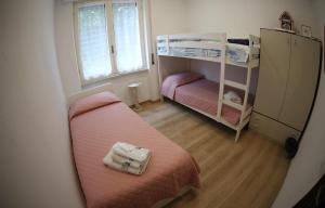 A bed or beds in a room at Villa Maremonti - con 3 piscine