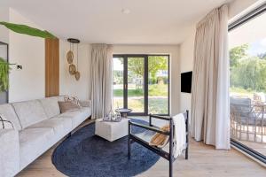 Et opholdsområde på Harderwold Villa Resort XL