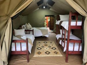 Moz Inn - Coconut View Resort 객실 침대