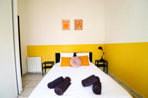 Ένα ή περισσότερα κρεβάτια σε δωμάτιο στο Le Spazioso - T3 Arcachon avec terrasse privative