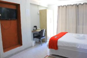 Fargon Guest House客房内的一张或多张床位