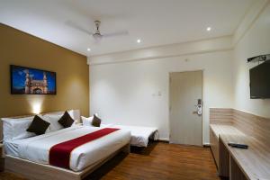 Postel nebo postele na pokoji v ubytování Open Hotel by Olive - Langford Suites