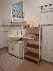 Ένα μπάνιο στο Ferienwohnung am Blumenberg