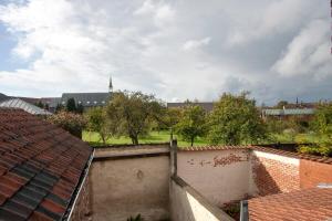 a view of a city with trees and buildings at Holidayhouse Balie in Bruges