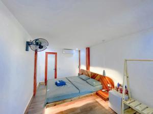 Tempat tidur dalam kamar di Green Town Mộc Châu
