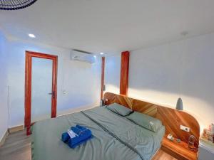 Tempat tidur dalam kamar di Green Town Mộc Châu