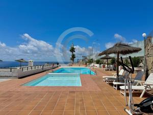 Piscina di Lovely Home o nelle vicinanze