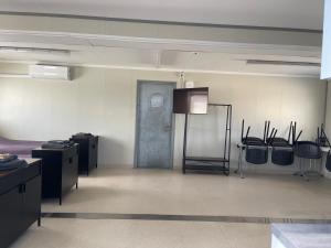 Posezení v ubytování Pabrades Apartamentai