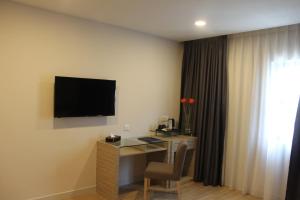 A television and/or entertainment centre at NU Hotel @ KL Sentral