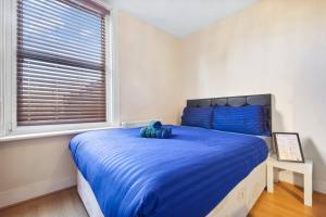 Ένα ή περισσότερα κρεβάτια σε δωμάτιο στο Lord's Guesthouse - Room 4