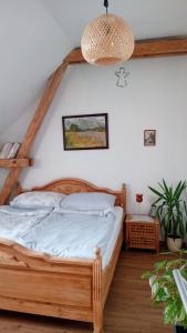Postel nebo postele na pokoji v ubytování Ráj za humny