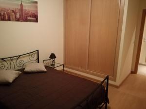 Ένα ή περισσότερα κρεβάτια σε δωμάτιο στο T2 Alto Quintão +2 φωτογραφίες