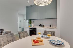 Kuchyň nebo kuchyňský kout v ubytování Gdańsk Old Town Scala suites C with Parking by Lion Apartments + 48 fotografií